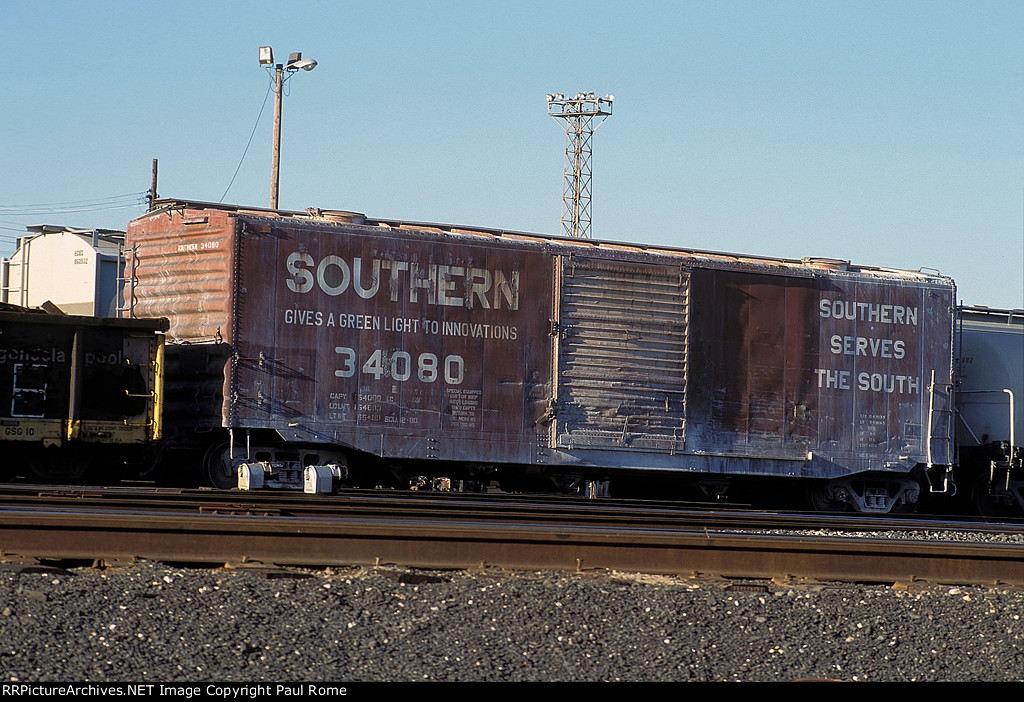 SOU 34080. 50-ft single door boxcar with roof hatches at the SP Englewood Yard